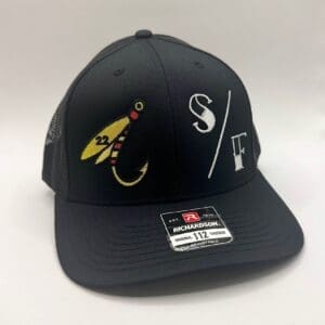 Black baseball cap with fishing hook and spear graphics.