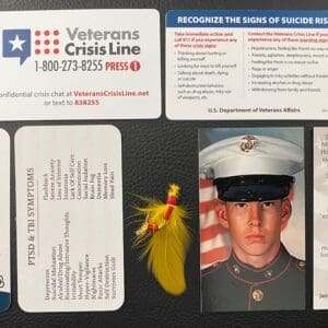 Collection of military and mental health awareness cards and photos.